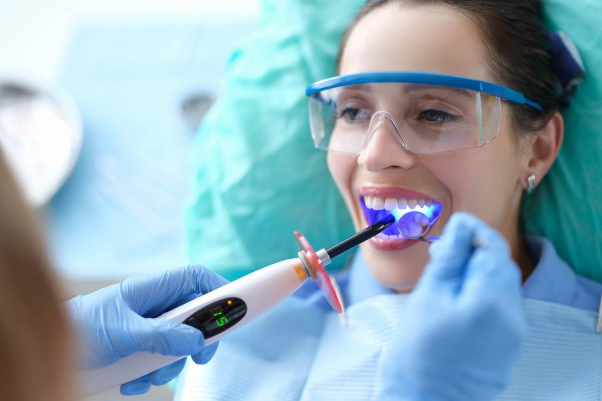 Concept image of patient having dental bonding to enhance teeth
