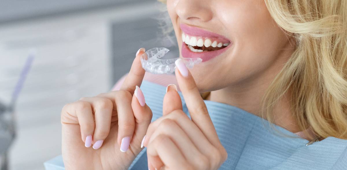 Woman wondering if her Invisalign should be loose